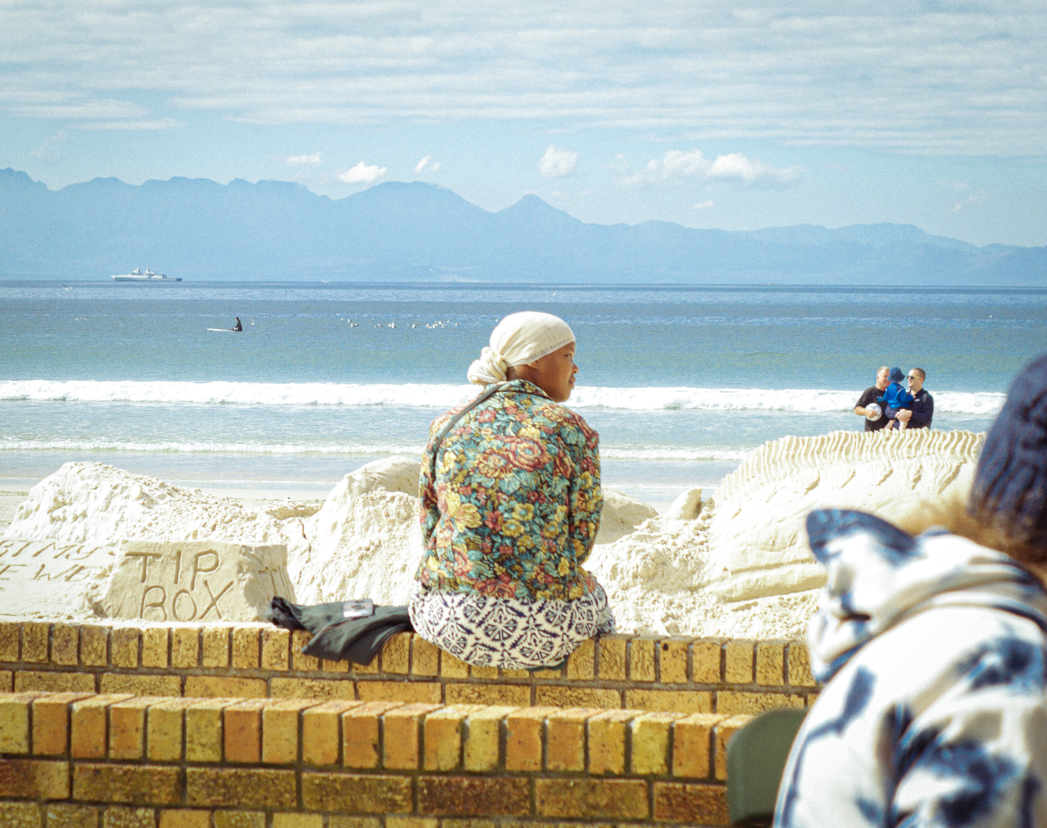 Woman sitting at the beach